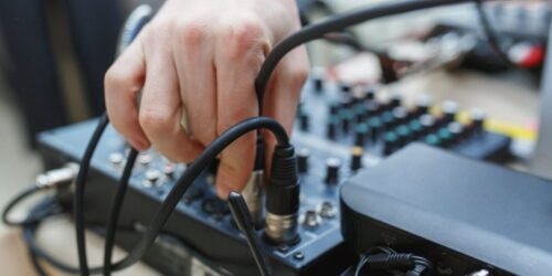 dj-connects-the-sound-equipment-for-the-event-or-party-scaled-1.jpg